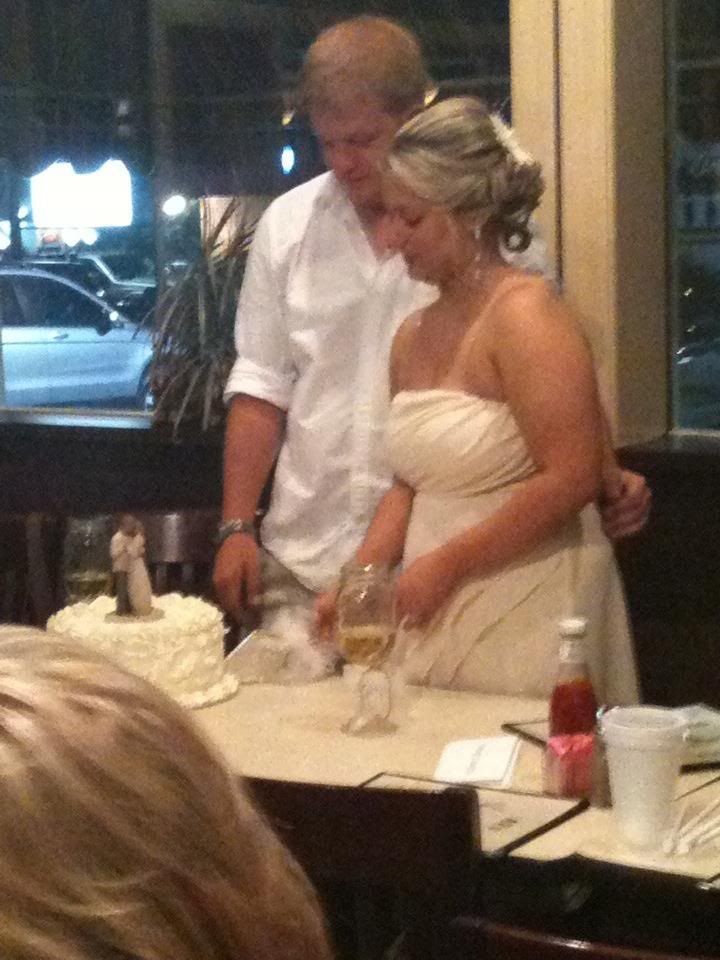 Chelsey's wedding 7/6/2012, cutting the cake