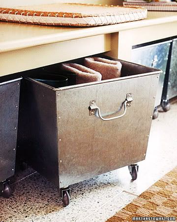 } Roll out storage bins tucked under a bench are a great storage 