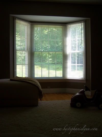 Make Your Own Bay Window Curtain Rod {Window Treatments for our Bay Windows}